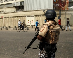 A soldier of Ivory Coast presidential guard stands guard at the port of Abidjan