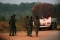 Mutinous soldiers who have taken control of Bouake stand at a checkpoint in Bouake <span>by REUTERS/ Thierry Gouegnon</span>